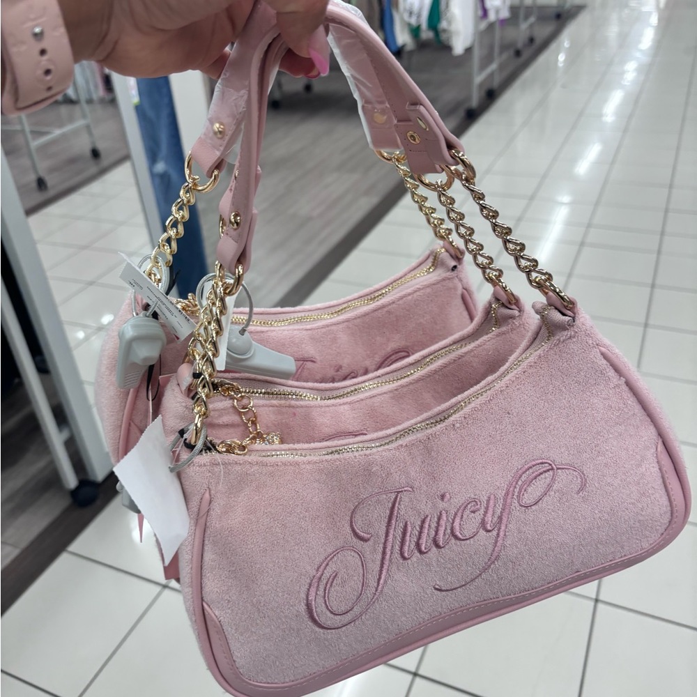 One Juicy Couture shoulder bag (it doesn’t have the pearls )